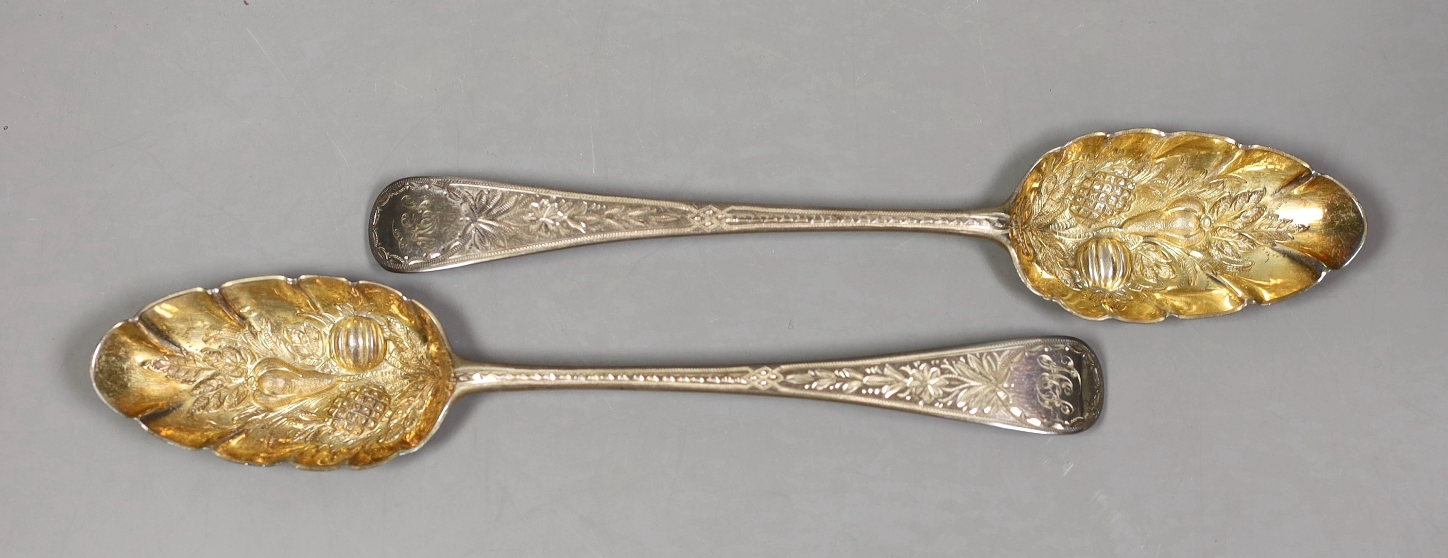 A pair of George III silver Old English pattern 'berry' spoons, Godbehere, Wigan & Bolt, London, 1803, 21.9cm, 132 grams.